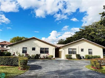 Photo of 4100-4106 NW 114th Ave, Coral Springs, FL 33065